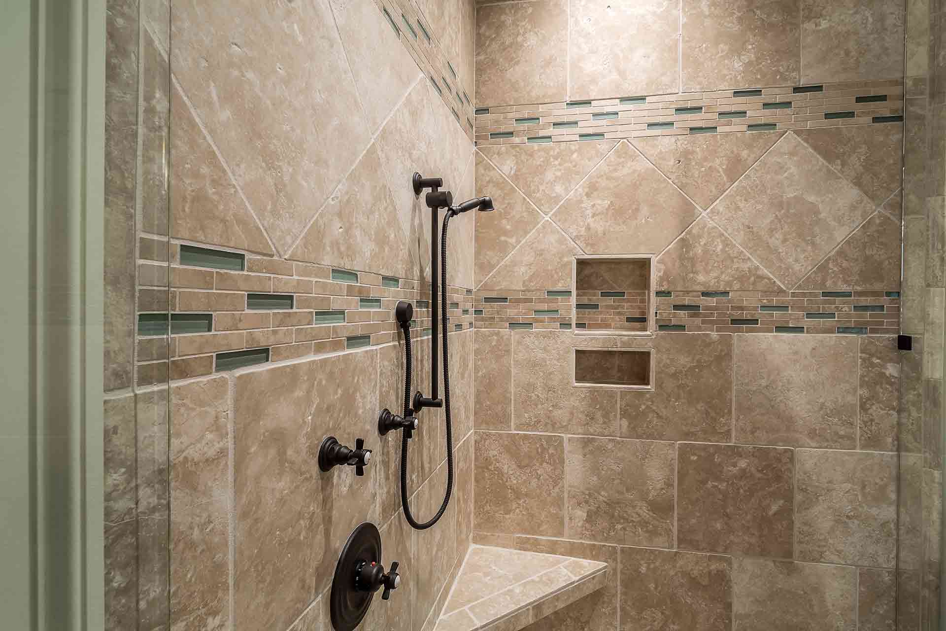 Professionally tiled shower with precise cuts and carefully finished grout lines